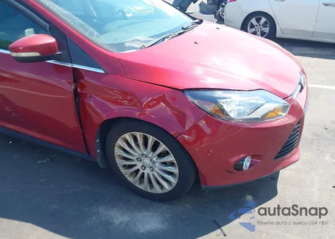 2012 Ford Focus Titanium z USA, uszkodzony, nr VIN 1FAHP3J21CL258049